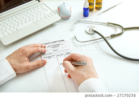 Doctor issues a prescription 27170258