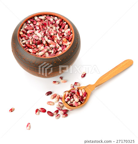 Ceramic pot with beans and wooden spoon 27170325