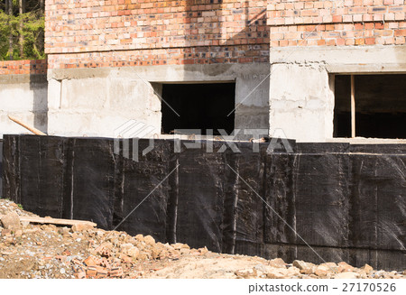 Stock Photo: Waterproofing basement and foundations