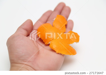 Hand with an orange peel Hand with an orange peel 27171647