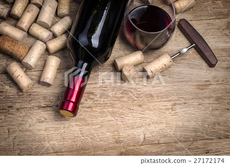 Glass bottle of wine with corks Glass bottle of wine with corks 27172174