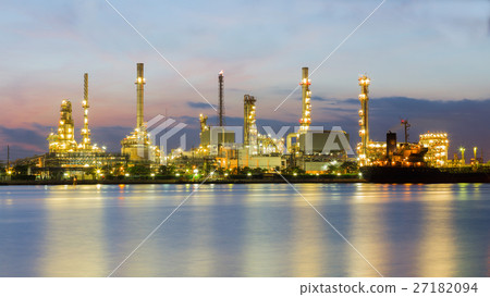 Sunrise over oil refinery light river front 27182094