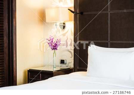 White pillow on bed White pillow on bed 27186746