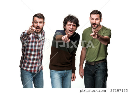 The three men are smiling, looking and pointing at The three men are smiling, looking and pointing at 27197155