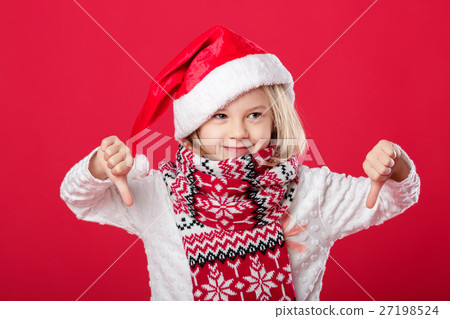 little girl in santa hat on red background little girl in santa hat on red background 27198524