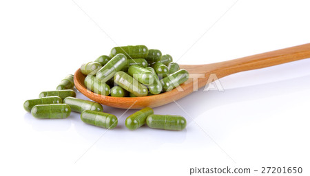 Moringa capsules in the spoon 27201650