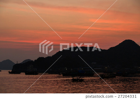 Asian fishing boats at sunset on a background of Asian fishing boats at sunset on a background of 27204331