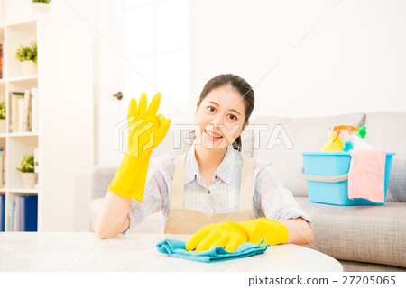 young housewife showing okay gesture done young housewife showing okay gesture done 27205065