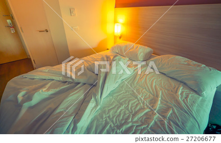 Bed and pillow after used . ( Filtered image processed vintage effect. ). 27206677