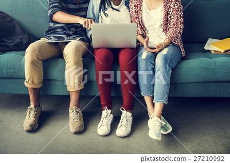 Diversity Friends Using Laptop Concept 27210992