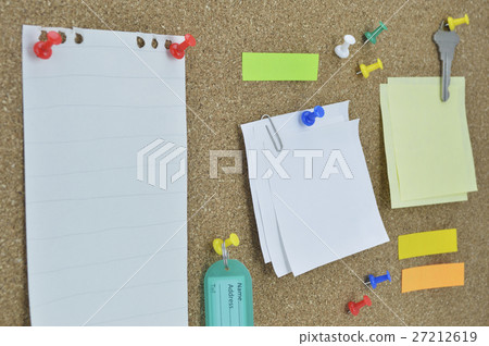 Sticky notes, pin, key and tag name on cork board 27212619
