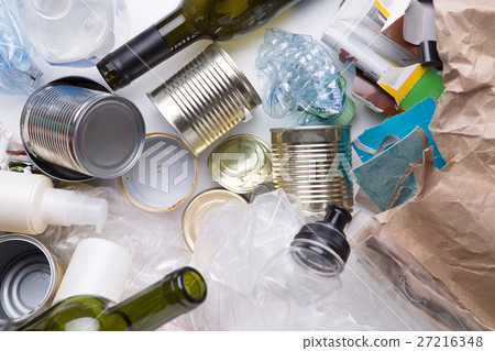Rubbish lies on white table 27216348