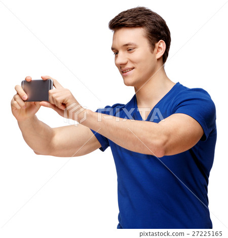 Handsome man isolated over white background 27225165