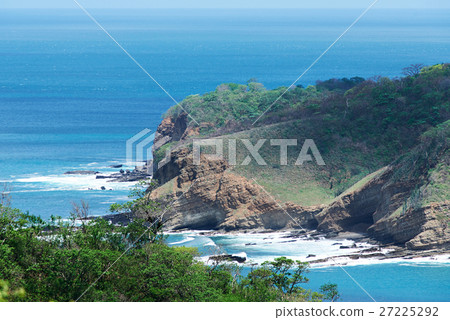 rock coast with blue sea rock coast with blue sea 27225292