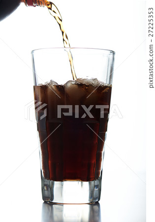 pouring brown soda into glass 27225353