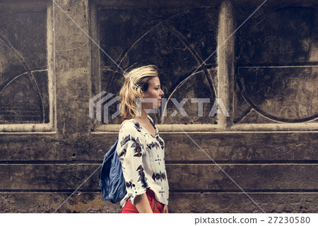 Young Woman Traveler Walking Concept Young Woman Traveler Walking Concept 27230580