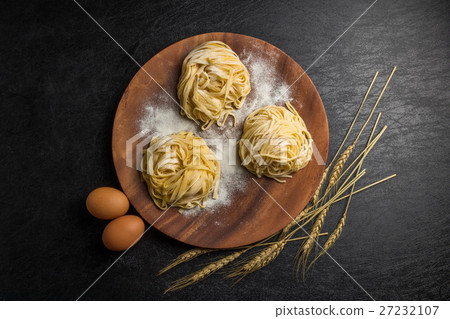 Italian food ingredients raw pasta fresh pasta and Italian ingredients Italian food ingredients raw pasta fresh pasta and Italian ingredients 27232107