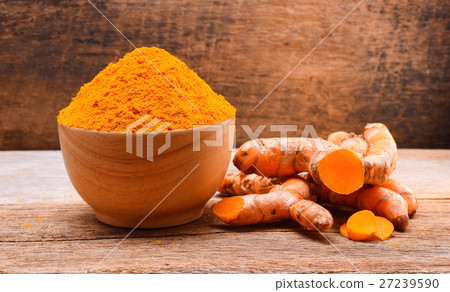 Turmeric roots with turmeric powder  27239590