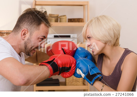 Couple man and woman having battle at home 27241066