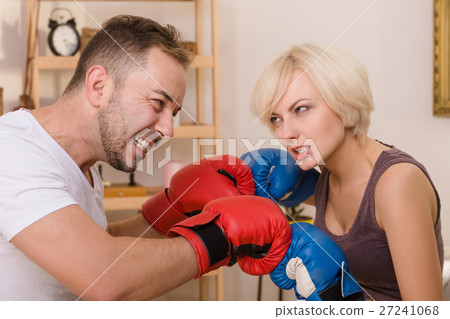 Couple man and woman having battle at home 27241068