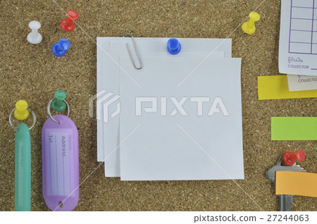 Colorful sticky notes and tag name on cork board 27244063