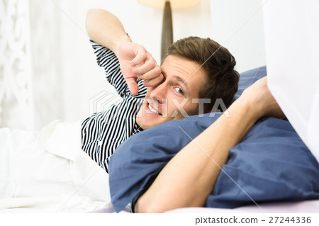 Man sleeping in bed Man sleeping in bed 27244336