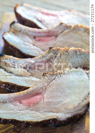 Grilled pork ribs on the wooden board Grilled pork ribs on the wooden board 27251174