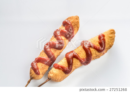 Corn dogs on the white background 27251268