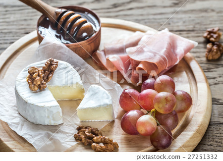 Camembert cheese with nuts and prosciutto 27251332
