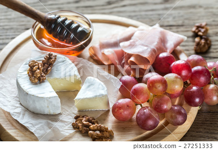 Camembert cheese with nuts and prosciutto 27251333