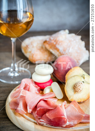 White wine with prosciutto and ciabatta White wine with prosciutto and ciabatta 27251650