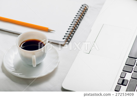 Cup of coffee at working place 27253409