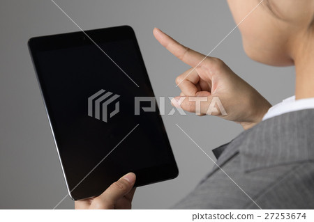 Woman who operates tablet PC, Internet, mail, browsing 27253674