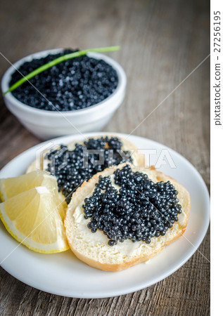 Sandwiches with black caviar Sandwiches with black caviar 27256195