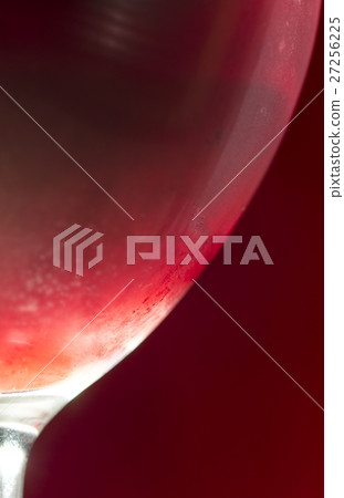Wineglass with cold red wine Wineglass with cold red wine 27256225