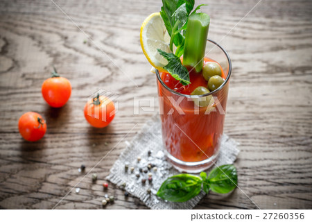 Bloody Mary cocktail on the wooden background Bloody Mary cocktail on the wooden background 27260356