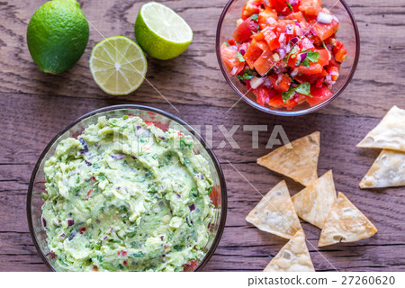 Bowls of guacamole and salsa Bowls of guacamole and salsa 27260620
