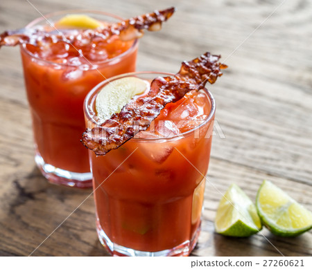 Two glasses of Bloody Mary with bacon rashers Two glasses of Bloody Mary with bacon rashers 27260621