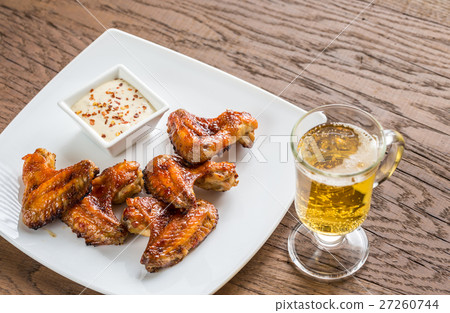 Baked chicken wings with spicy sauce Baked chicken wings with spicy sauce 27260744