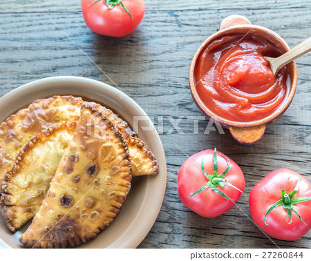 Meat Patties on the wooden background 27260844