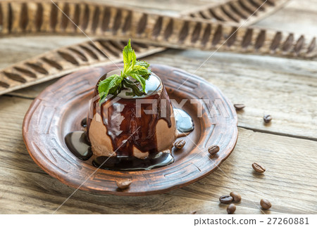 Coffee panna cotta under chocolate topping 27260881