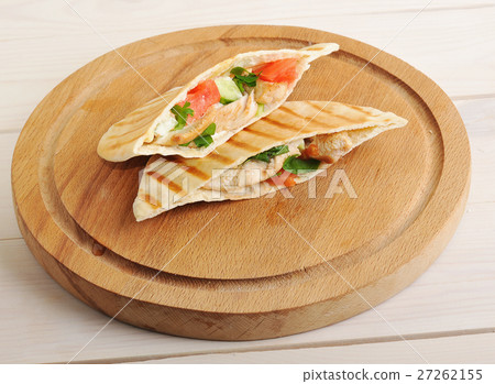 flatbread pita filled with chicken breast flatbread pita filled with chicken breast 27262155