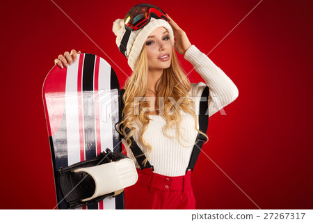 Woman with a snowboard 27267317