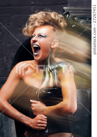 Portrait of screaming punk woman long exposure Portrait of screaming punk woman long exposure 27267451