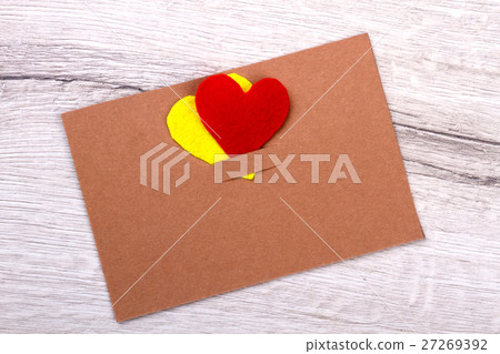 Greeting card on wooden backdrop. Greeting card on wooden backdrop. 27269392