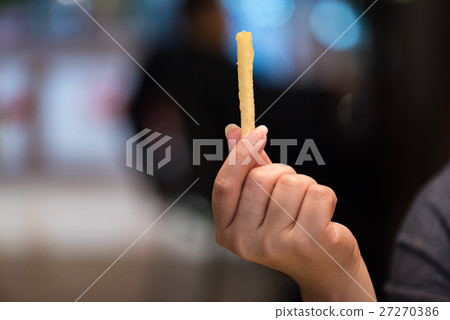 Frenh fries in hand 27270386