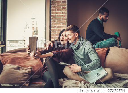 Group of multi ethnic young students preparing for Group of multi ethnic young students preparing for 27270754