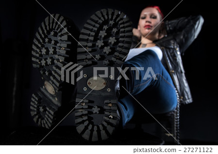 Skinhead boots and sitting woman 27271122