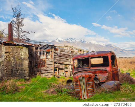 Old car behind a shack Old car behind a shack 27273495