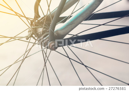 rust on bicycle wheel. 27276381